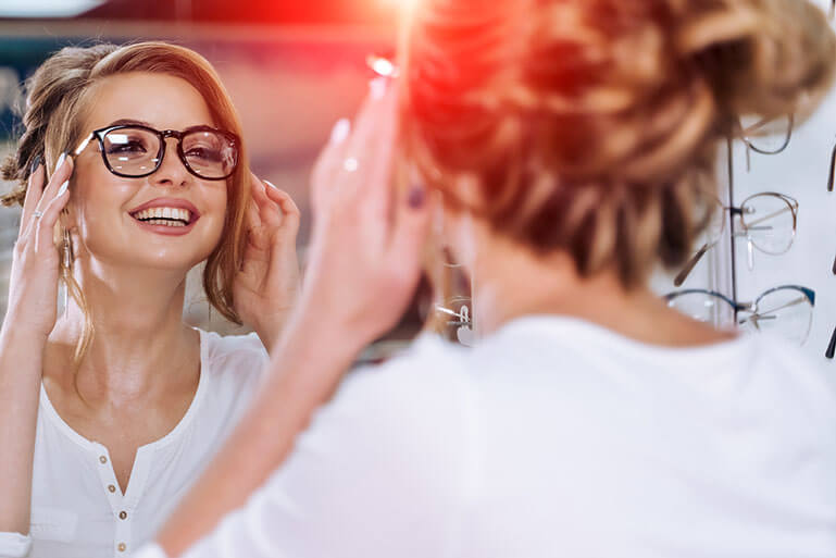 Woman Trying on Glasses